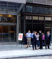 AOL employees wait to go into the Burnham building in downtown crossing
