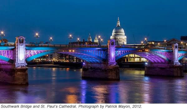 Southwark bridge lit at night