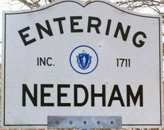 sign for the town of Needham MA